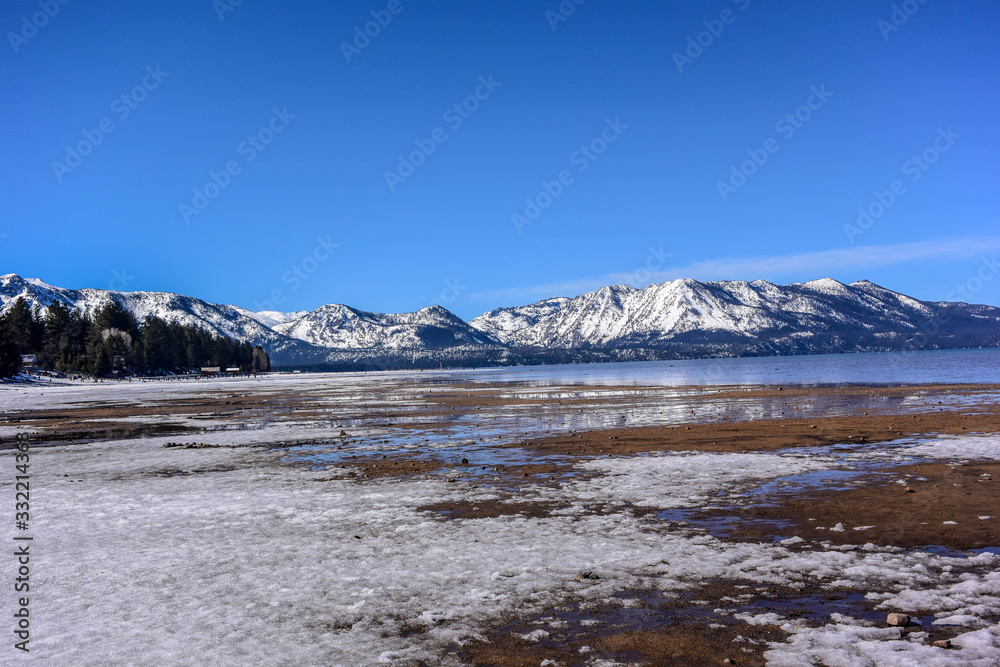 Beach covered by snow along the Lake Tahoe in California