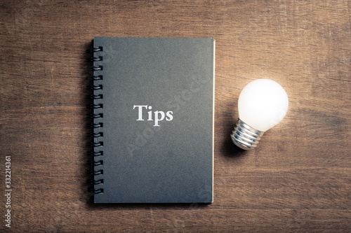 Tips book and Light Bulb photo