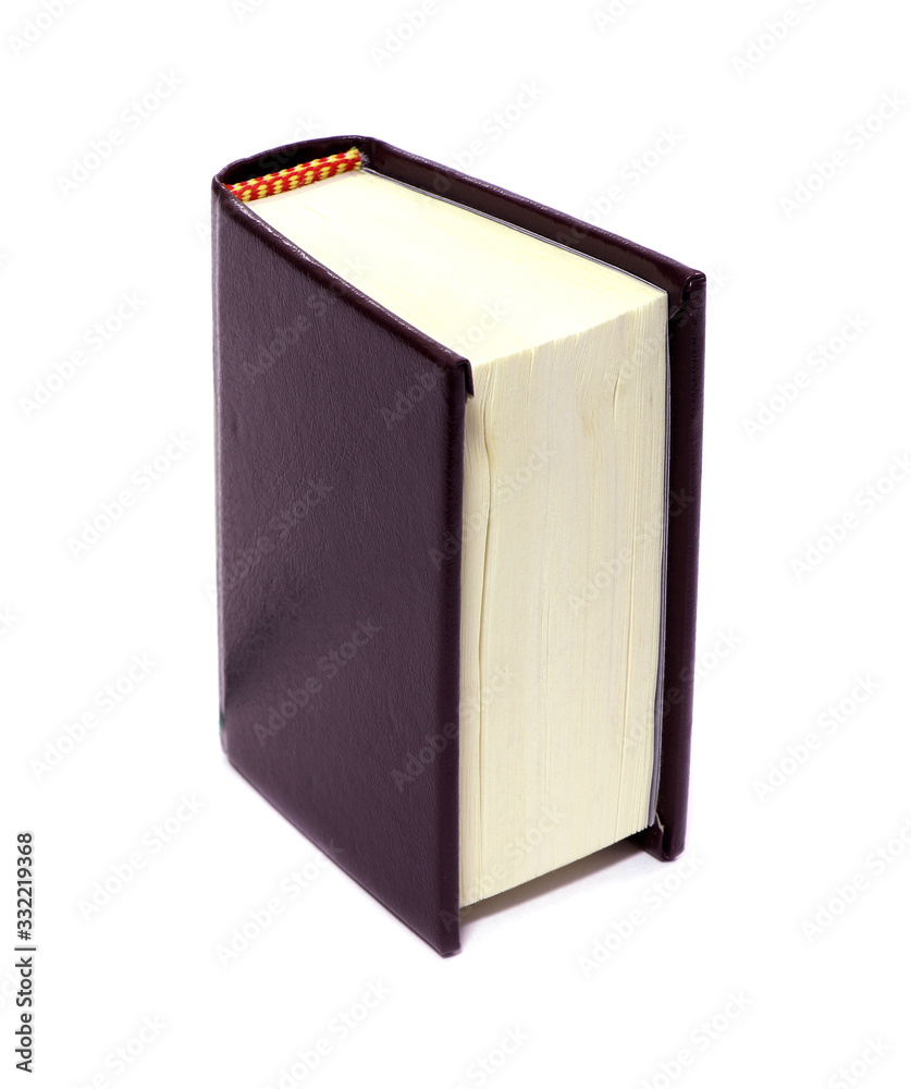 A book isolated on white background. A mini souvenir dook isolated. A book isolated on white background. A mini souvenir dook isolated.