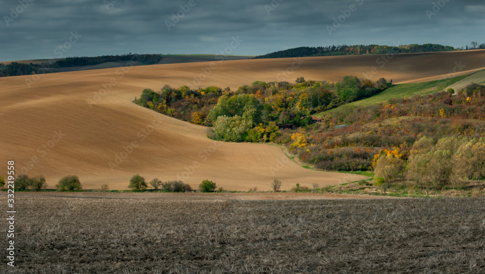 Beautiful harsh landscape of plowed Moravian fields in the autumn season