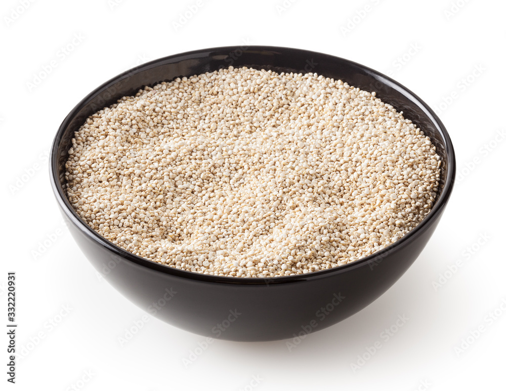Dried white quinoa seeds in black bowl isolated on white background with clipping path Dried white quinoa seeds in black bowl isolated on white background with clipping path