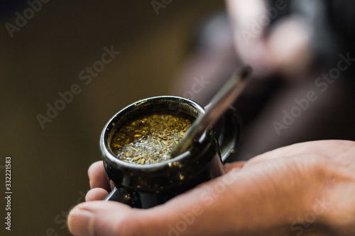 hands holding a cup of tea