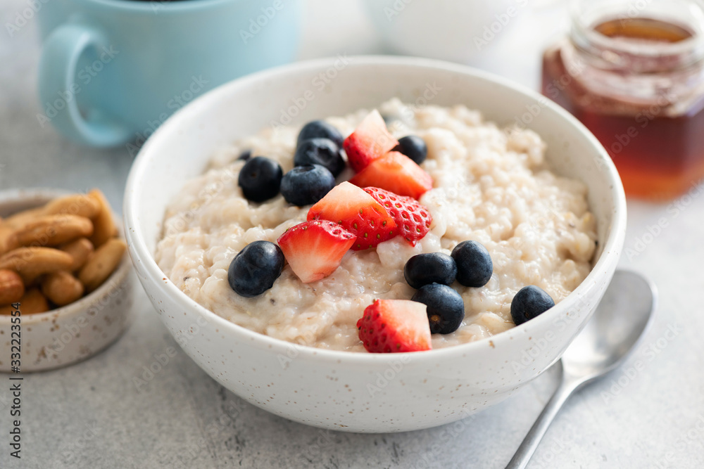 Porridge Bowl With Fresh Summer Berries In Bowl. Clean Eating Dieting Concept. Oatmeal With Berries Porridge Bowl With Fresh Summer Berries In Bowl. Clean Eating Dieting Concept. Oatmeal With Berries