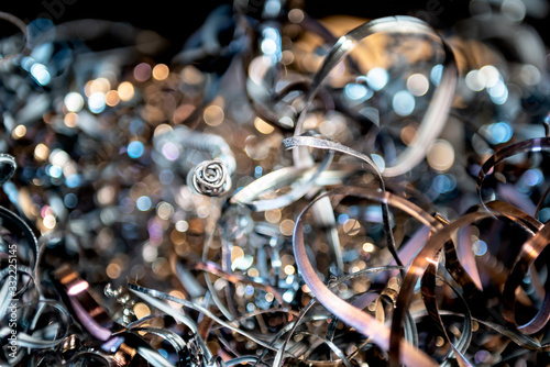 Blurred and Abstract images of Many scrap from industrial metal, which can be recycled By melting new ones, concept to Waste recycling and industry