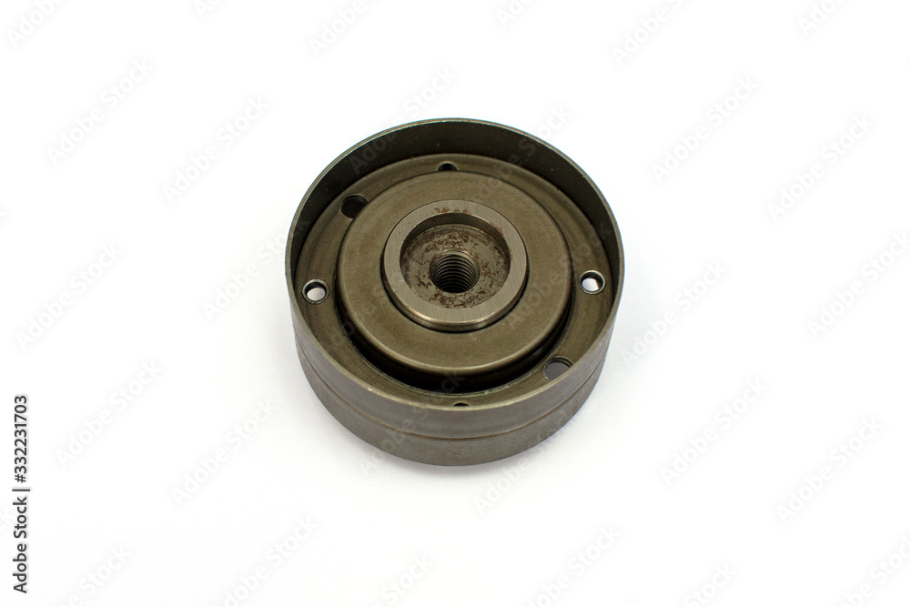 Car belt tensioner isolated on the white background. Spare parts. Car belt tensioner isolated on the white background. Spare parts.