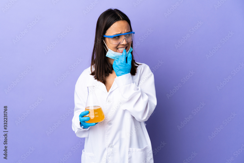 Scientist woman investigating a vaccine to cure coronavirus disease nervous and scared