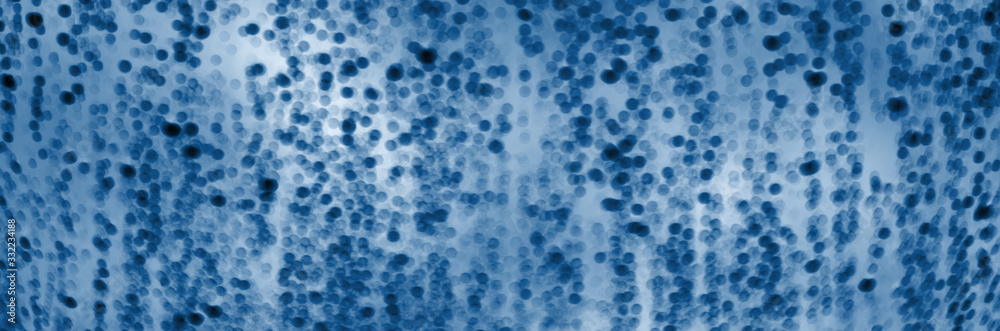 Water drops. Blur background classic blue toned Water drops. Blur background classic blue toned