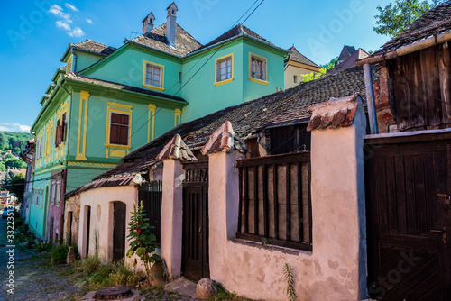 Residential buildings in historical part of Sighisoara city, Romania photo