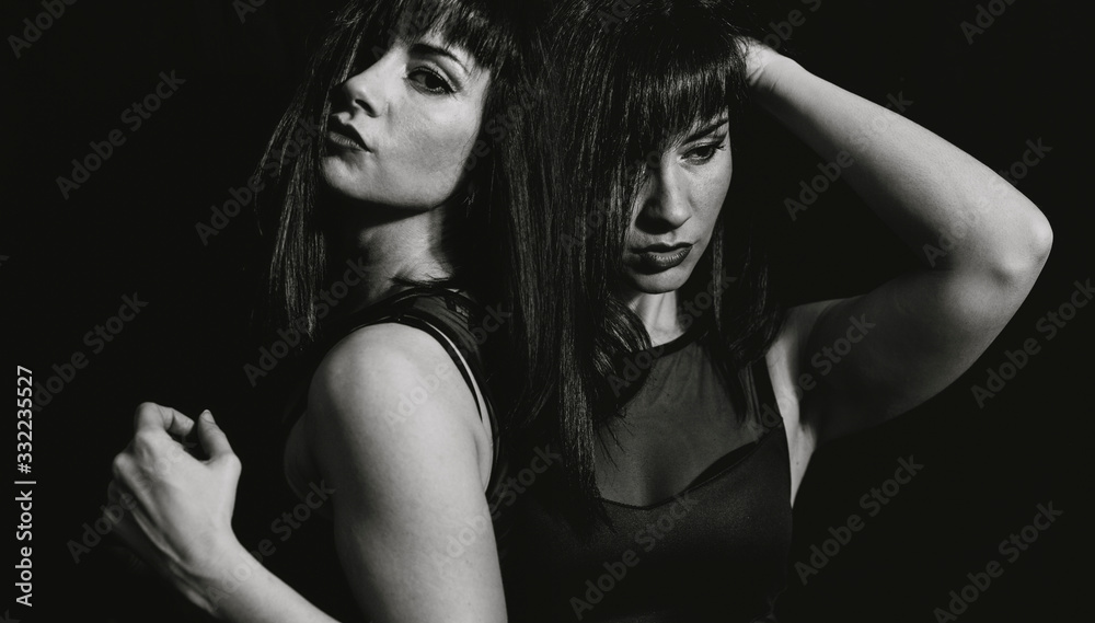 women posing on black background women posing on black background