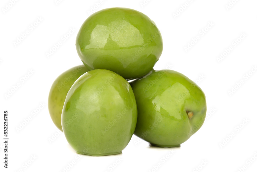 Pickled olives on a white background. Several pickled green olives isolated on a white background. Pickled olives on a white background. Several pickled green olives isolated on a white background.
