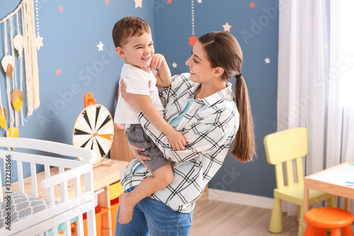 Nanny and cute little boy a...