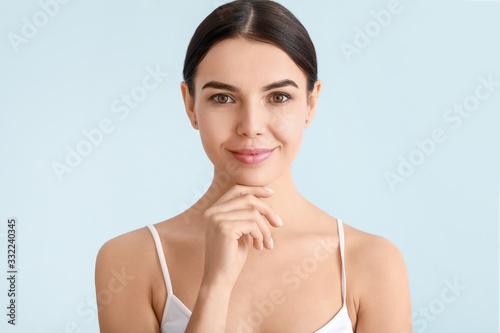 Beautiful young woman with ...