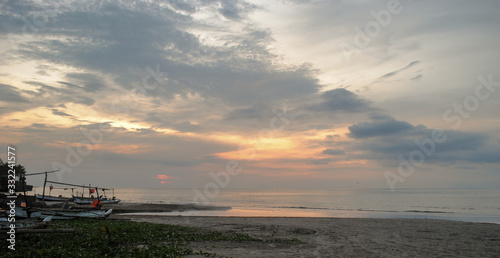  Sunset beach and traditional fishing boats