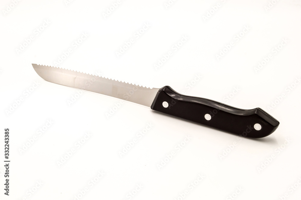 Chromium sawtooth knife with a black handle Chromium sawtooth knife with a black handle