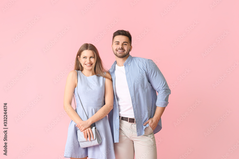 Happy young couple on color background Happy young couple on color background