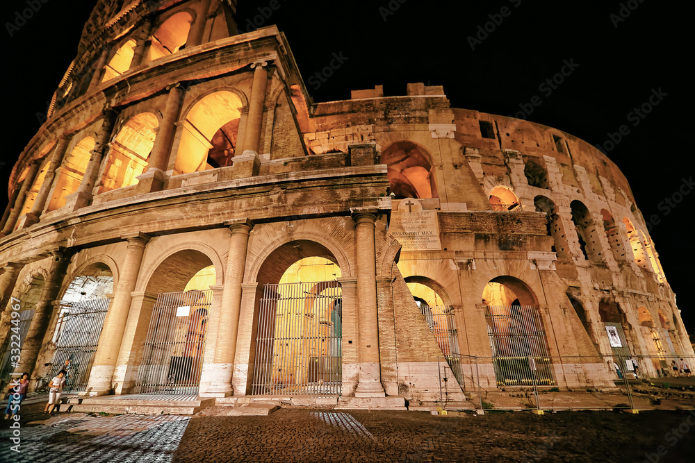 Colosseum in city center of Rome Italy at night