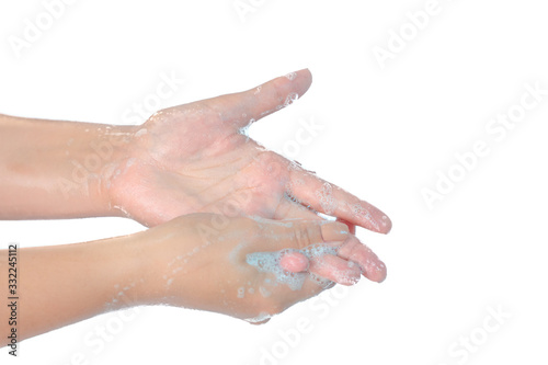 Close up of washing hands with soap isolated on white background Coronavirus prevention hand hygiene. Corona Virus pandemic protection by cleaning hands frequently.