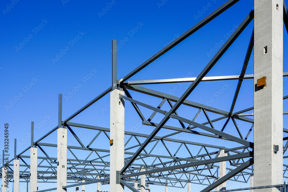 The steel frame of a building under construction The steel frame of a building under construction