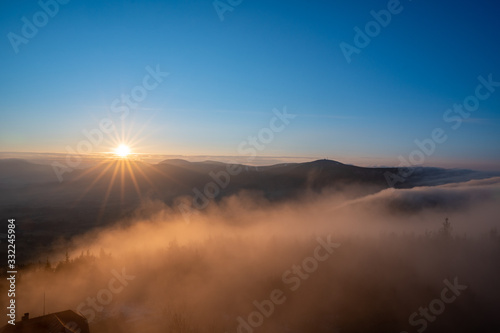 sunrise in mountains with fog and beautiful clear sky, czech Beskydy, Velky Javornik