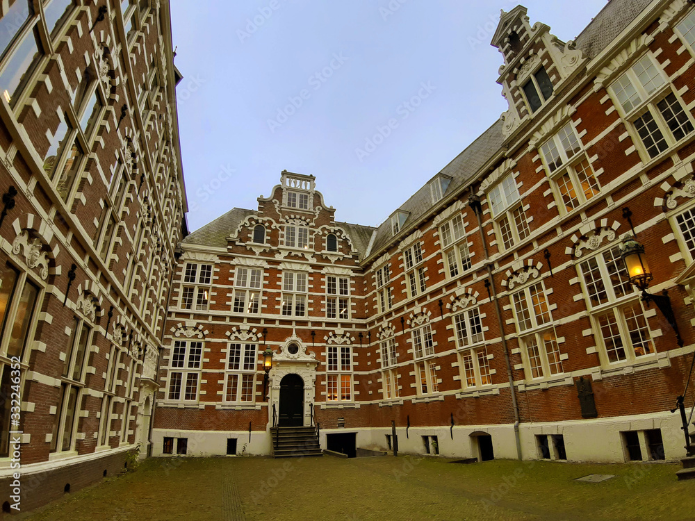Fototapeta premium inner courtyard of an university building in amsterdam built with the classic red bricks
