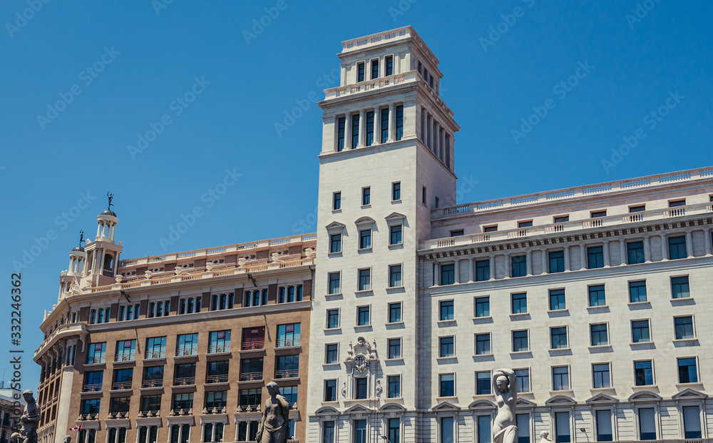 Buildings of Public Library of Barcelona and Banco Espanol de Credito at Catalonia Square, Spain