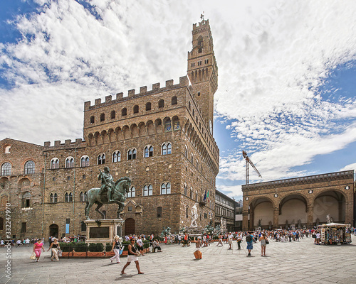 Old Palace (Palazzo Vecchio) on Square of Signora (Piazza della Signoria) in Florence in Italy in summertime