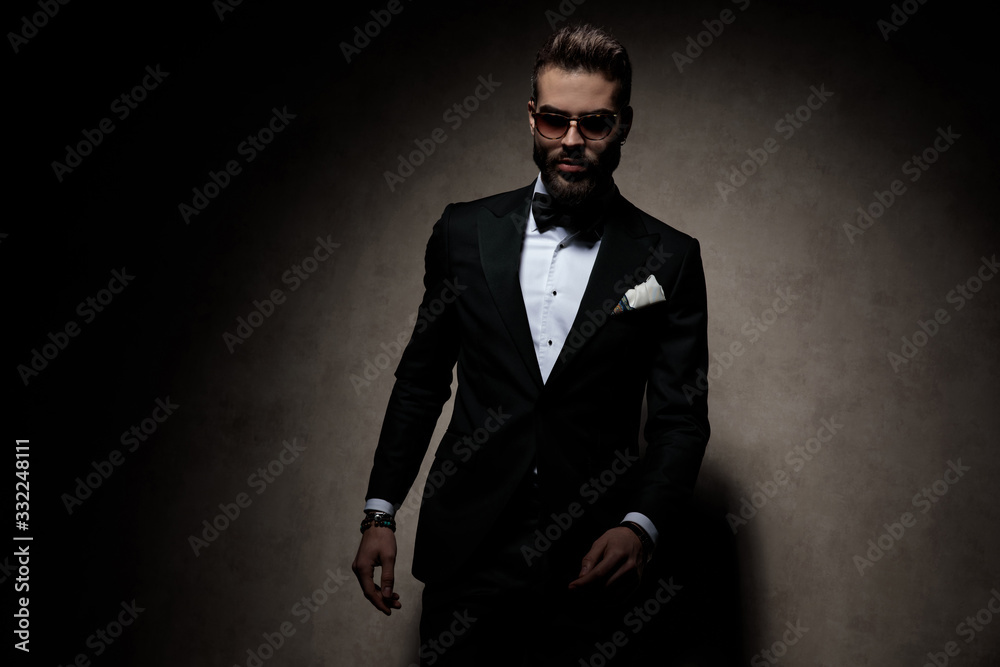 businessman standing and looking at camera serious businessman standing and looking at camera serious