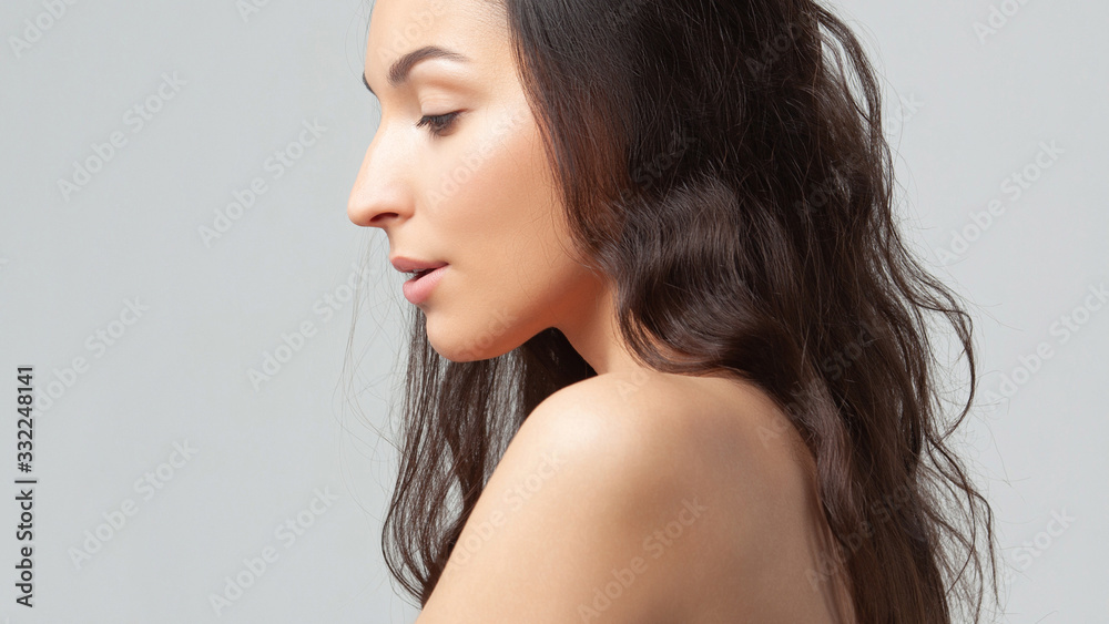 Young beautiful woman with clean perfect skin close-up Young beautiful woman with clean perfect skin close-up