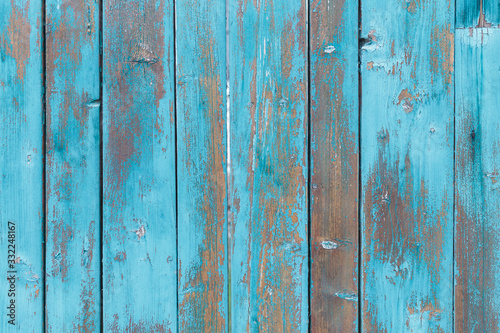 Blue wooden boards or fence texture background or backdrop with old paint