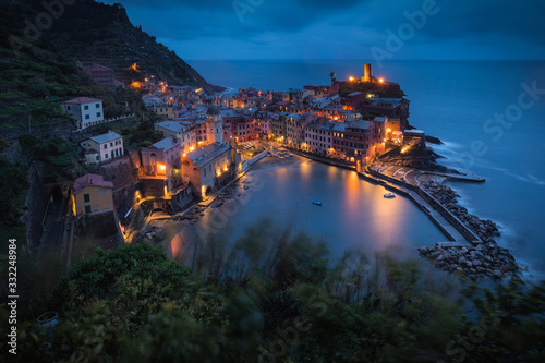 Fototapeta Illuminated Vernazza village in Cinque Terre National Park at night, UNESCO World Heritage