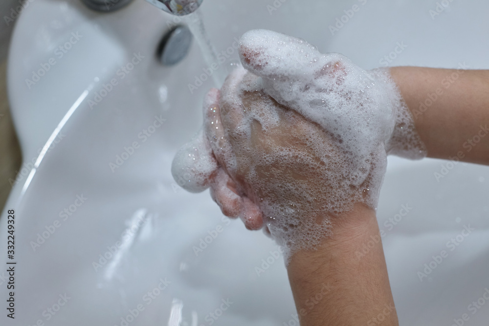 Fototapeta premium Washing hands rubbing with soap kid for coronavirus protection.