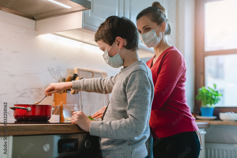 Family cooking at home during coronavirus crisis Family cooking at home during coronavirus crisis