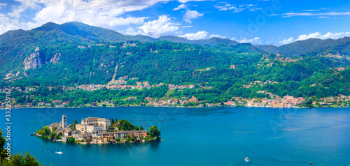Fototapeta Naklejka Na Ścianę i Meble -  Beautiful lakes of Italy - lago d'Orta (Orta San Giulio ) and small pictorial island with monastery and village . Piedmont