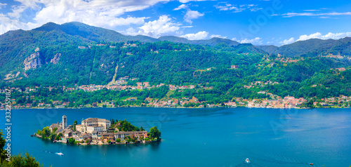 Beautiful lakes of Italy - lago d'Orta (Orta San Giulio ) and small pictorial island with monastery and village . Piedmont photo