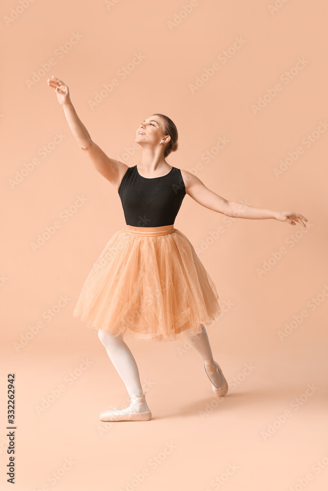 Beautiful young ballerina on color background Beautiful young ballerina on color background