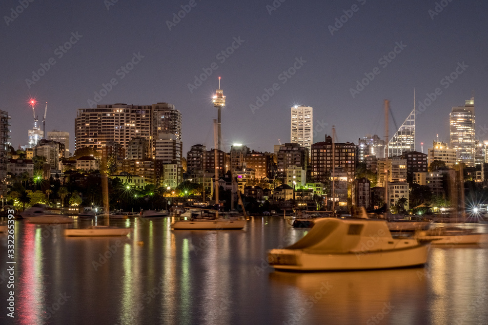 Fototapeta premium sydney skyline at night with yachts