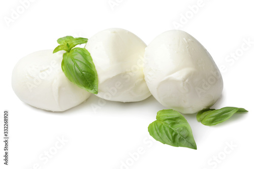 Mozzarella cheese with basil on white background