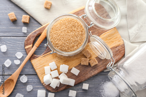 Fotografie Different sugar on wooden background