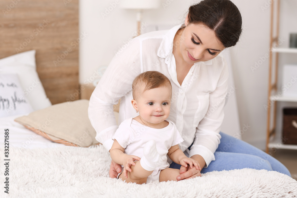 Happy mother with cute little baby at home Happy mother with cute little baby at home