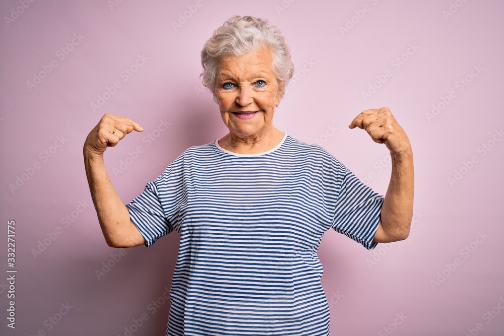 Senior beautiful grey-haired woman wearing casual t-shirt over isolated pink background looking confident with smile on face, pointing oneself with fingers proud and happy. Senior beautiful grey-haired woman wearing casual t-shirt over isolated pink background looking confident with smile on face, pointing oneself with fingers proud and happy.