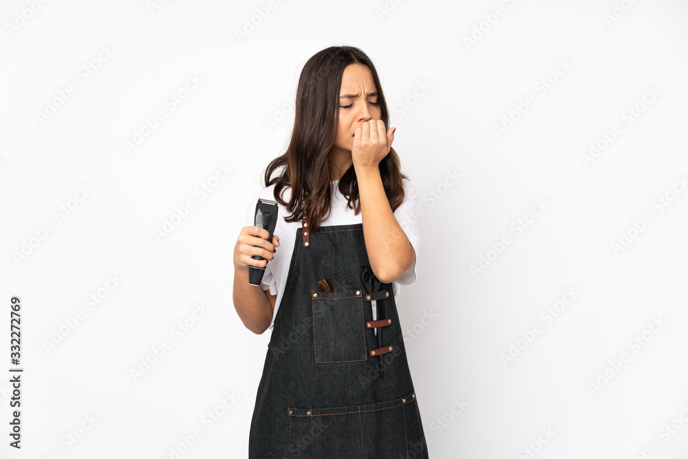 Young hairdresser woman isolated on white background having doubts Young hairdresser woman isolated on white background having doubts