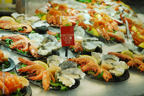 Fresh seafood platter of shrimp and oyster on sale. The Sydney Fish Market is a fish market in Sydney, New South Wales, Australia. 