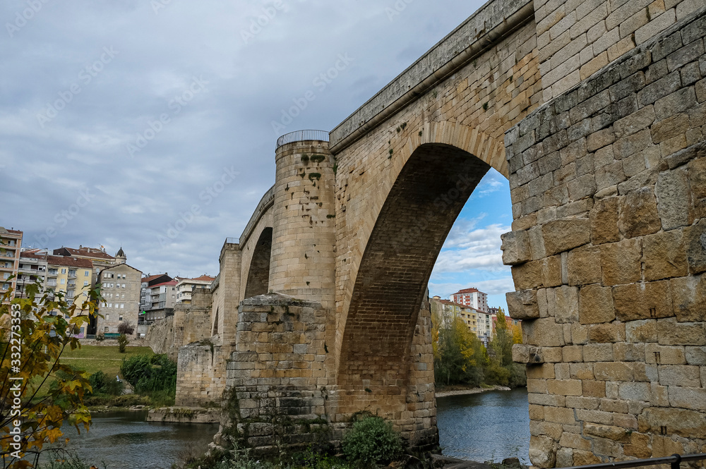 Bridge of Roman foundation over the river Miño in Ourense. Galicia, Spain.