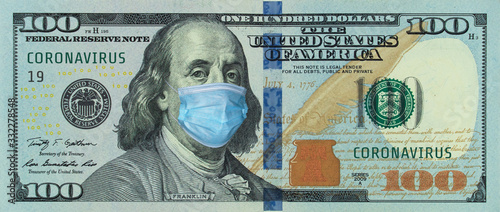 Medical mask on a banknote of 100 dollars, concept of the global financial crisis. Medical mask or surgical mask on american money. COVID-19 coronavirus in USA. Doctor mask protects against COVID-19.
