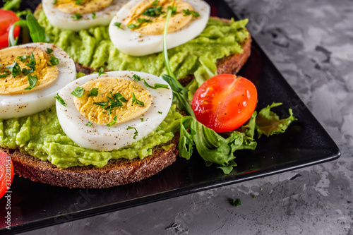 tasty and nutritious avocado sandwich and boiled egg