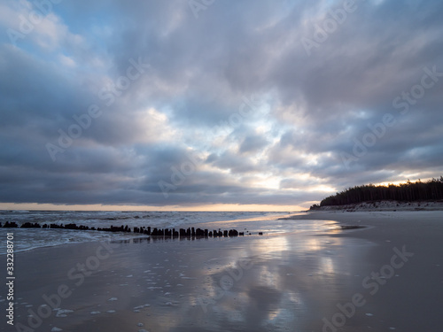 Sunrise at the estuary of the Piasnica River  Poland  Debki. Dramatic sky.