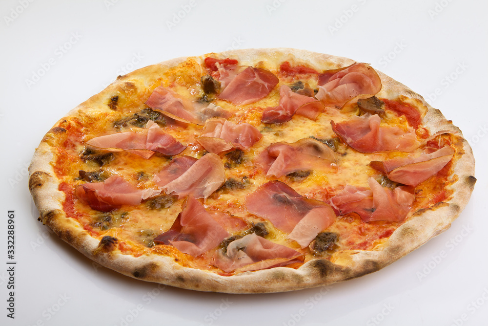 Flatlay of Italian pizza on white background. Rustic homemade pizzas with salami, bacon,  cheese, eggs and raw vegetables on shabby wooden background. Healthy vegetarian fungi pizza