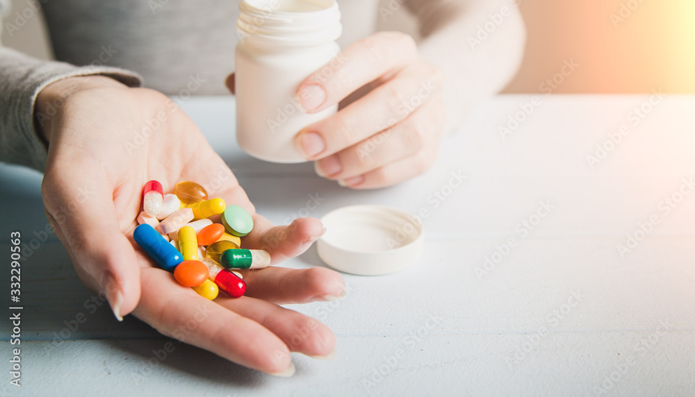 Woman drink pills in morning