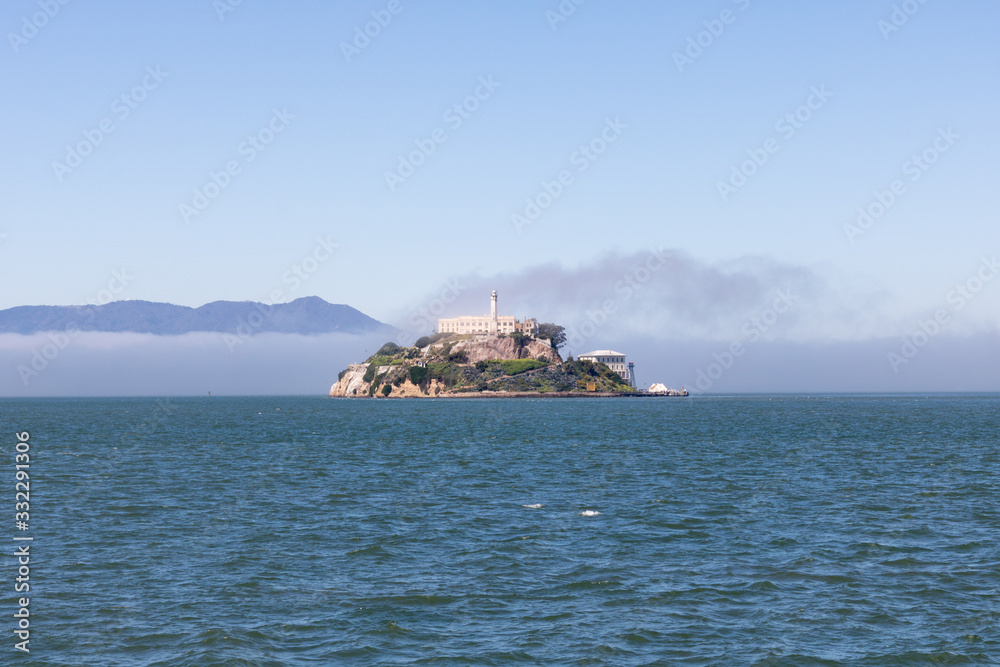San Francisco, USA - March 2020 - View of Alcatraz Island in San Francisco, California, on a foggy day. Feredal prison.