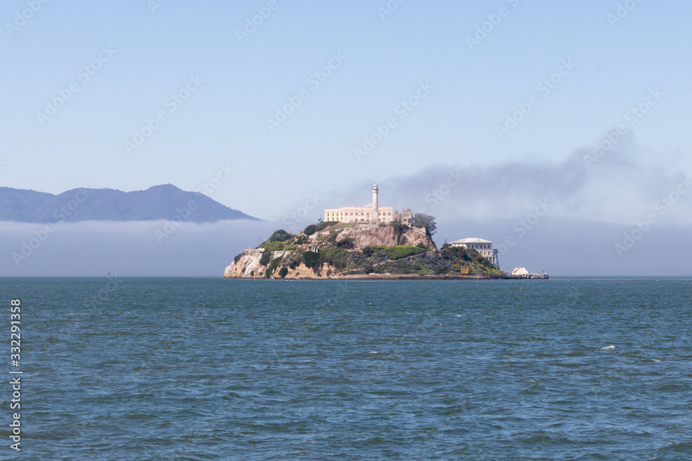 San Francisco, USA - March 2020 - View of Alcatraz Island in San Francisco, California, on a foggy day. Feredal prison.